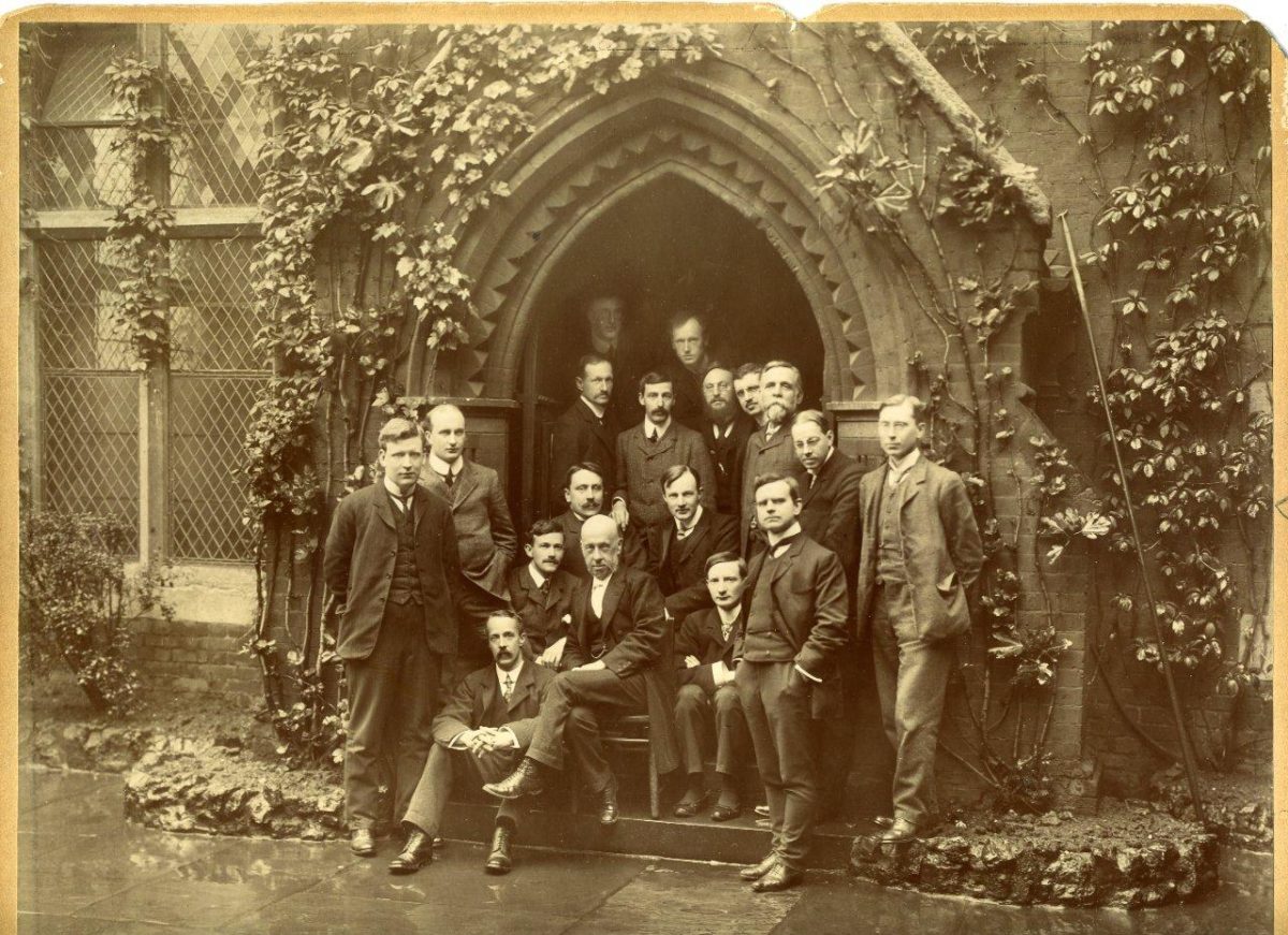 Warden Samuel Barnett with residential volunteers at Toynbee Hall, c. 1903.